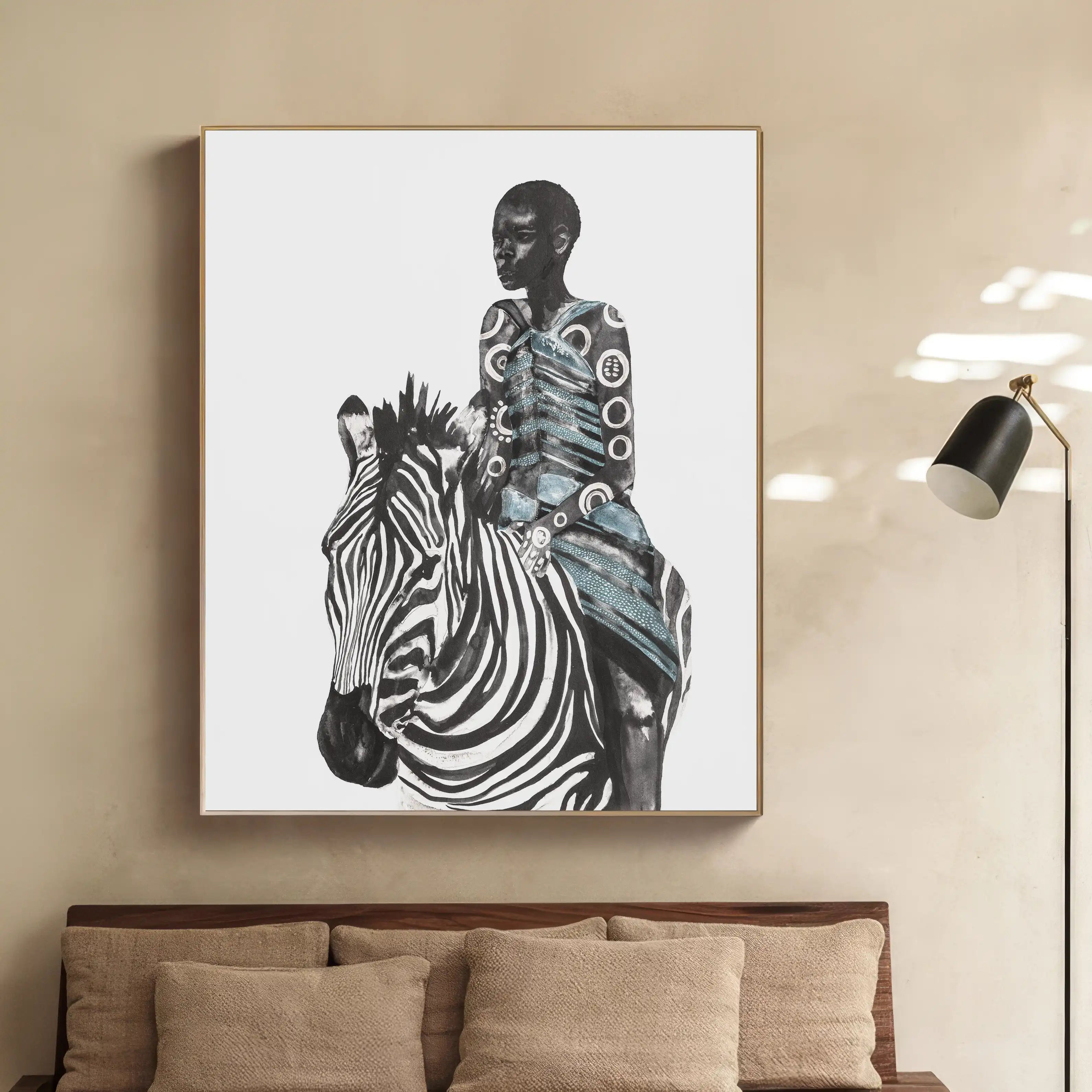 Framed artwork of a zebra and a person with patterns on a beige wall.